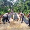 Polres Tapteng Tuntaskan Renovasi Jembatan di Desa Satahi Nauli “Dengan Nama Merah Putih Presisi”
